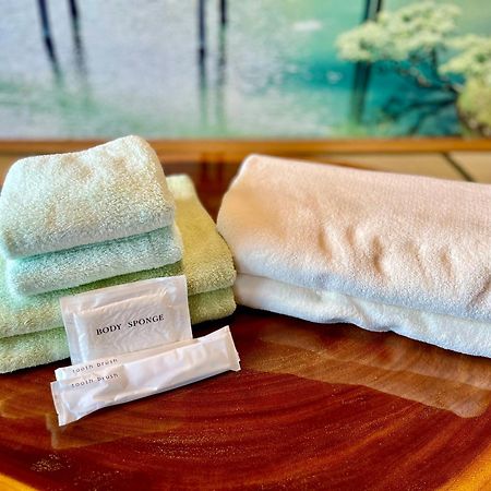 バーベキューもできる! 海と浜比嘉大橋を一望できる宿 Henza Ngoại thất bức ảnh